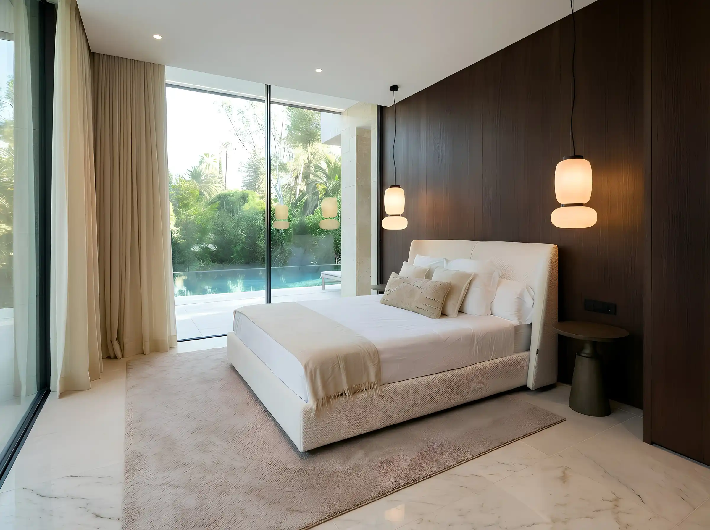 Principal bedroom with full-height glazing to the garden